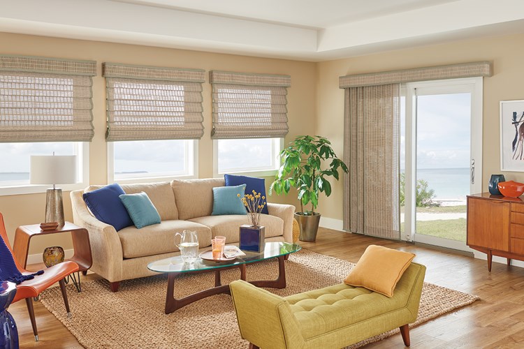 Sliding Panels with Wand Control: Spree, Studio T0745 with 1" Edge Banding: Light Sage 7173 and 6" Palisade Valance in Vertical Orientation with Valance-Only Privacy Liner: Sand 2701.
Standard Looped Roman Natural Shades with Cord Lift: Spree, Studio 80745 with 1" Edge Banding: Light Sage 7173 and 6" Palisade Valance in Vertical Orientation with Valance-Only Privacy Liner: Sand 2701